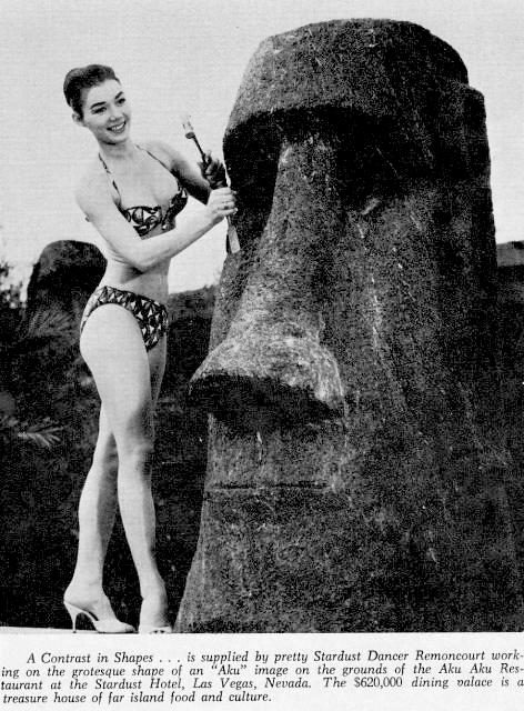 Female Model carving one of the smaller moai sculptures