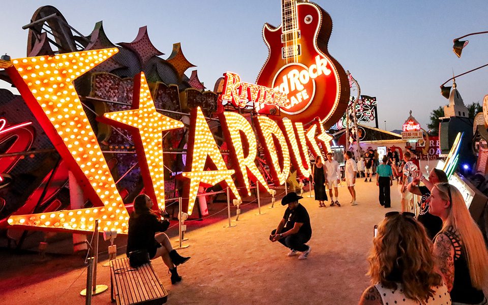 Visitors enjoying the glow of The Neon Museum