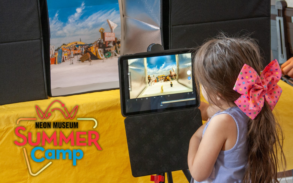 A child learns to animate at The Neon Museum.