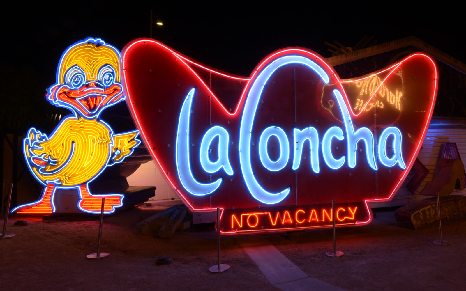 The Ugly Duckling and La Concha sign at the Neon Boneyard who are a part of The Neon Museum sign collection.