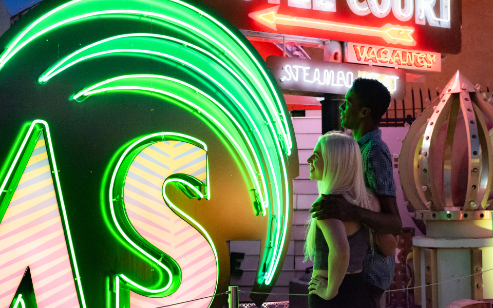 A couple admiring the palms signs