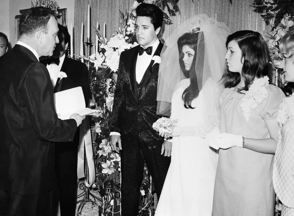 An image of Elvis and Priscilla Presley's wedding ceremony