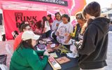 Punk Rock Museum in the Neon Boneyard interacting with families during STEAM.