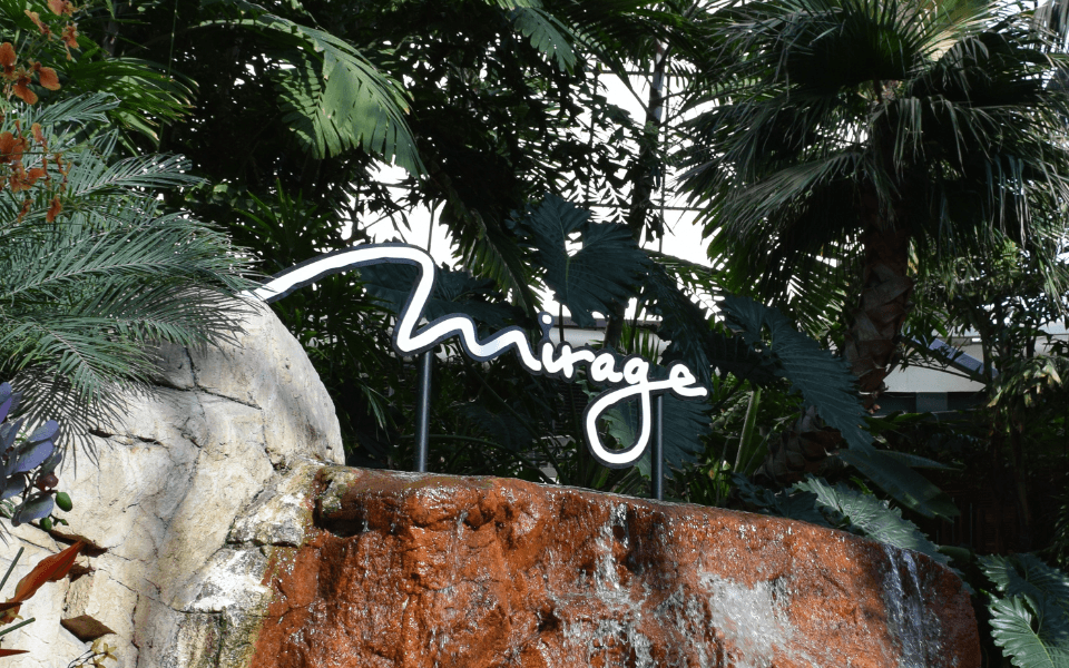 An image of the Mirage sign in the lagoon.