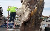 Hartlauer Signs employee prepping the Siegfried & Roy sculpture for fiberglass patching