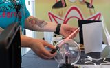 Neon Tube lighting up with a plasma ball during STEAM Family Fest.